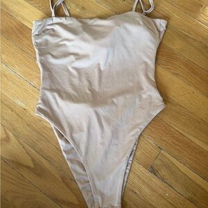 Nude open back body suit